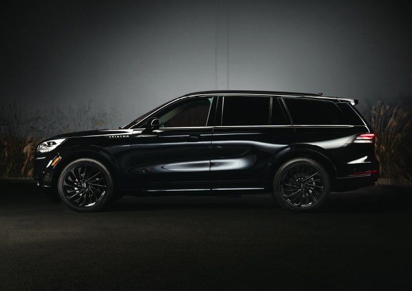 A 2024 Lincoln Aviator® SUV is shown in the Infinite Black exterior color | Doral Lincoln in Doral FL