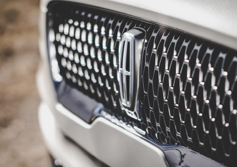 The grille of the 2024 Lincoln Aviator® Reserve model with an eye-catching repeated field of Lincoln Star logo shapes | Doral Lincoln in Doral FL