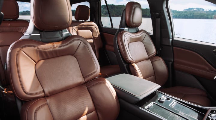 The front row's Perfect Position Seats in a 2024 Lincoln Aviator® Reserve model with Ebony Roast interior | Doral Lincoln in Doral FL