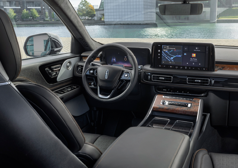 The interior of the 2025 Lincoln Aviator® SUV is shown parked with a view of a harbor through the windshield. | Doral Lincoln in Doral FL